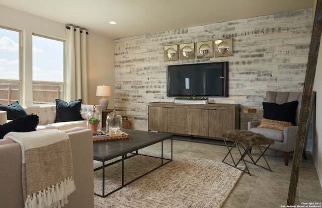 living room featuring light tile flooring