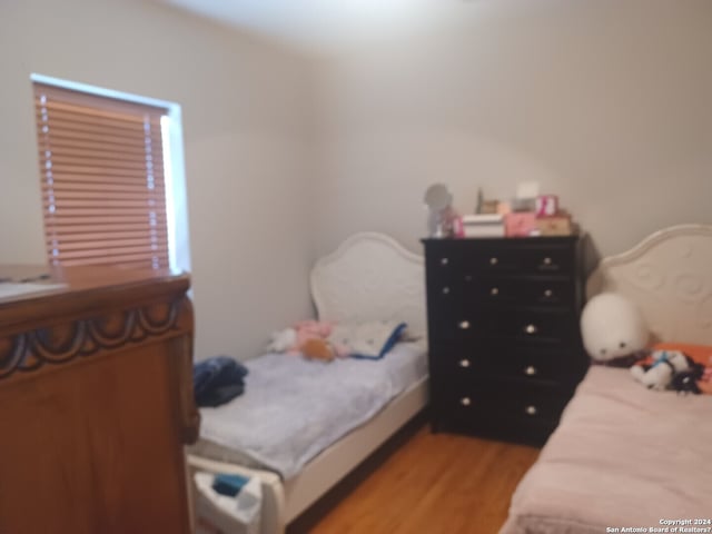 bedroom featuring light hardwood / wood-style floors