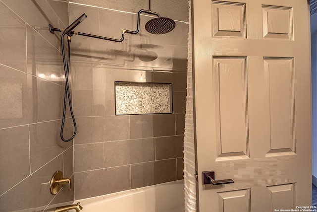 bathroom with shower / tub combo with curtain