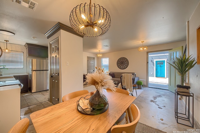 dining room featuring a notable chandelier