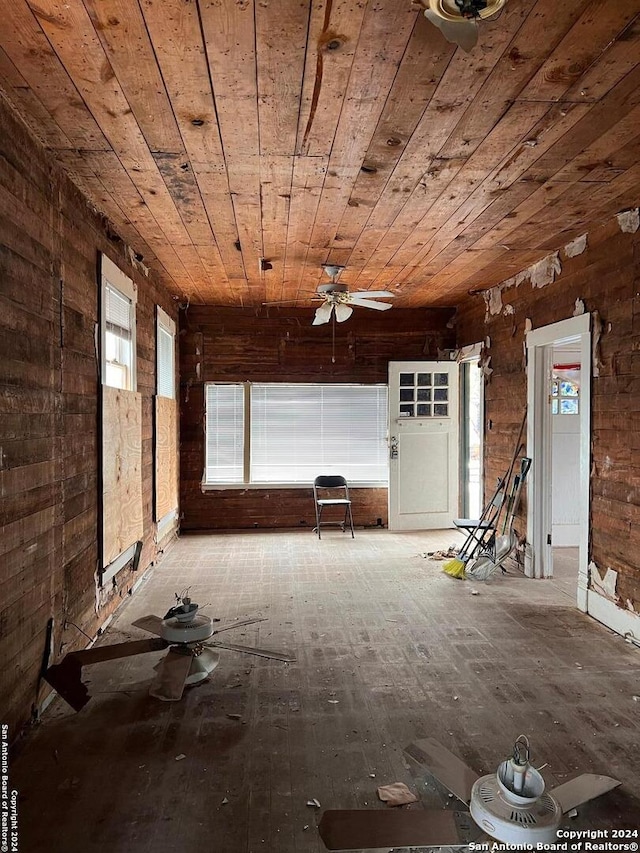 miscellaneous room featuring wood ceiling and ceiling fan