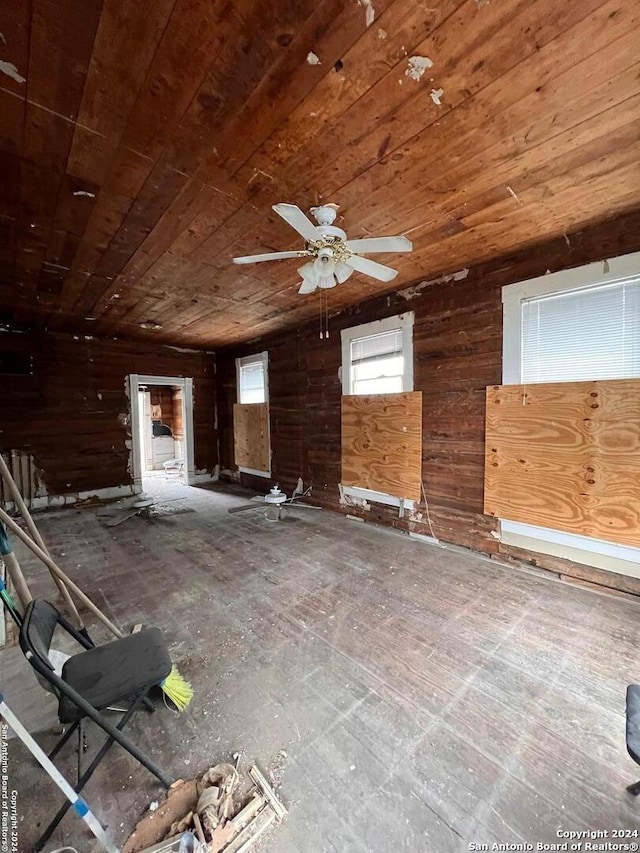 miscellaneous room featuring wood ceiling and ceiling fan