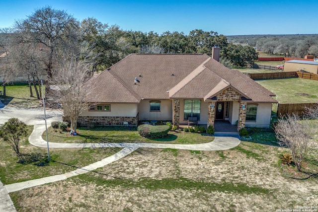 view of front of home with a front yard