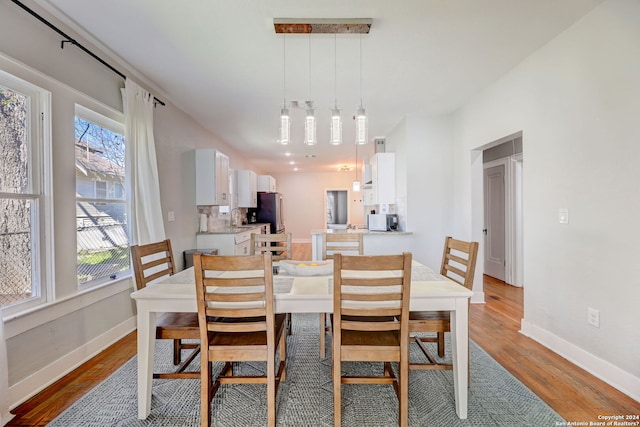 dining area featuring light hardwood / wood-style flooring