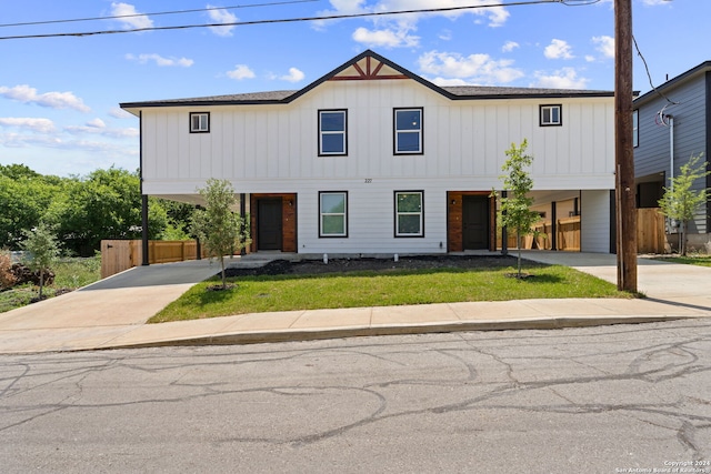 view of front of property with a carport