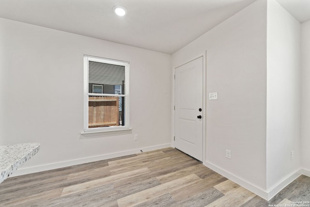 entryway with light hardwood / wood-style flooring