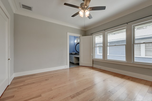 spare room featuring ornamental molding, light hardwood / wood-style flooring, and ceiling fan