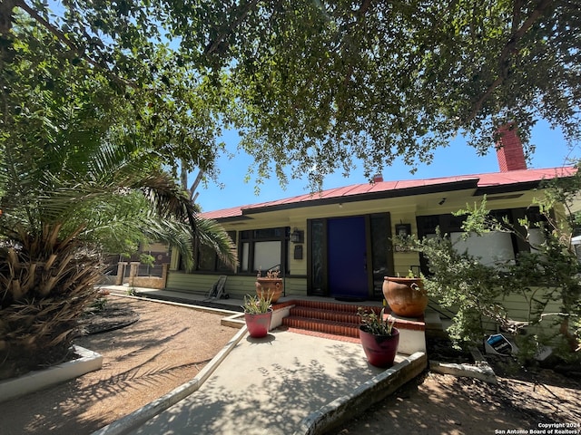 ranch-style house featuring a patio area