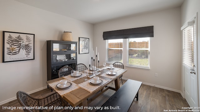 dining room featuring dark hardwood / wood-style flooring