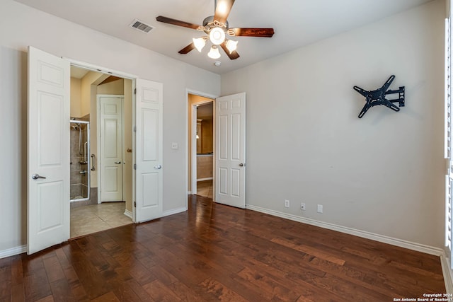 unfurnished bedroom featuring ceiling fan and hardwood / wood-style flooring