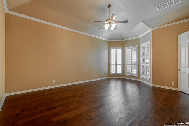 spare room with dark hardwood / wood-style flooring, ceiling fan, lofted ceiling, and ornamental molding