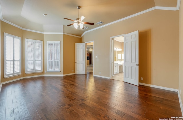 interior space with crown molding, dark hardwood / wood-style flooring, ceiling fan, and lofted ceiling