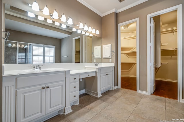 bathroom featuring tile flooring, ornamental molding, and double vanity