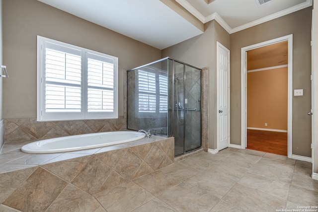 bathroom with crown molding, plus walk in shower, and tile floors