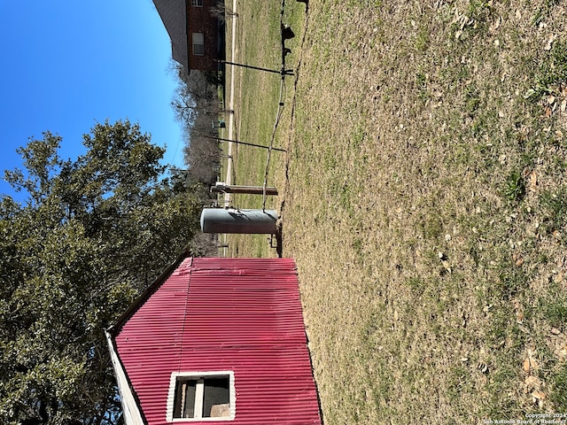 exterior space with a yard