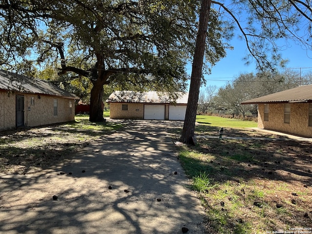 view of yard featuring a garage