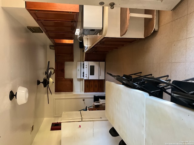 kitchen featuring white cabinetry