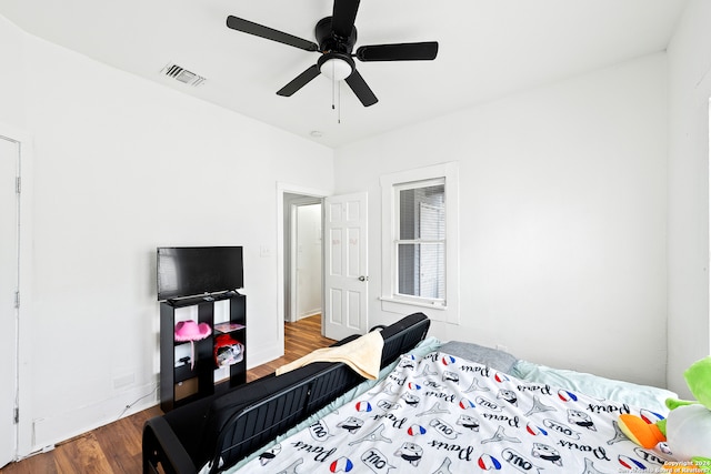 bedroom featuring wood-type flooring and ceiling fan