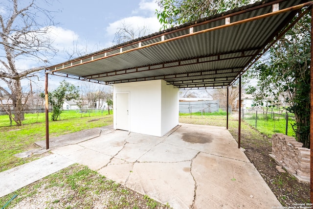 view of patio / terrace with a carport