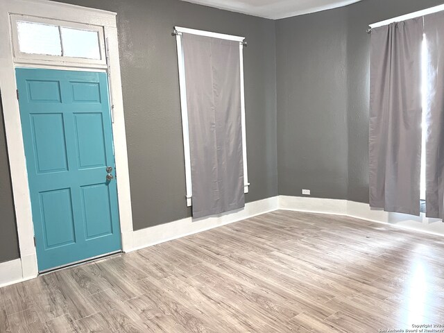 foyer entrance featuring light wood-type flooring