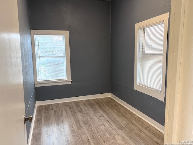 empty room featuring hardwood / wood-style floors