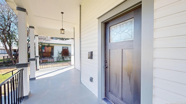 entrance to property with covered porch