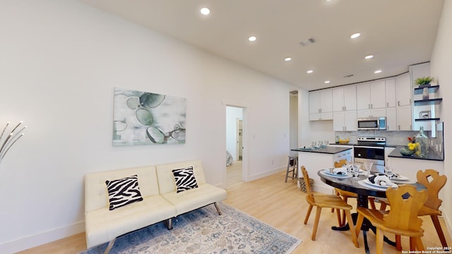 dining room featuring light hardwood / wood-style floors