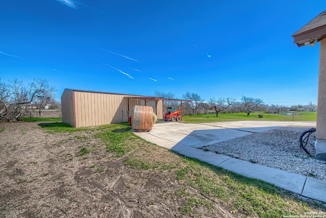 view of yard with a playground and an outdoor structure