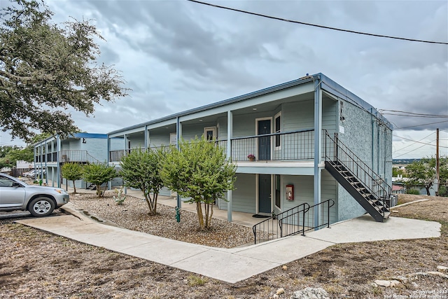 view of front of home with a balcony