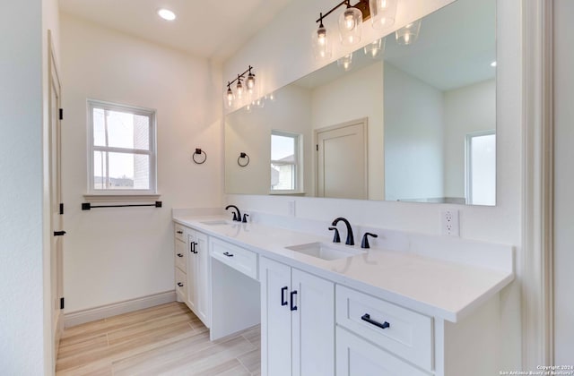 bathroom with dual bowl vanity