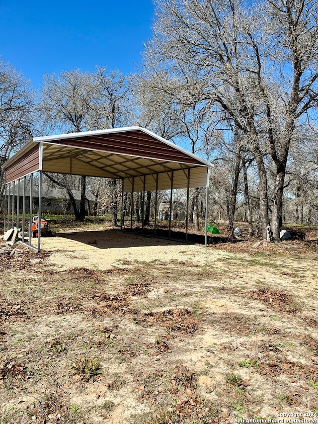 view of yard featuring a carport