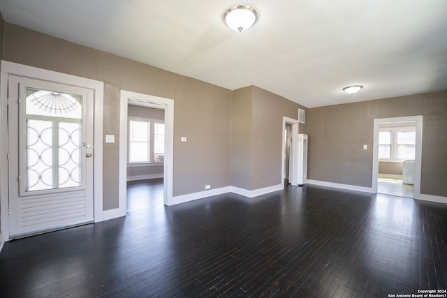 interior space with dark wood-type flooring