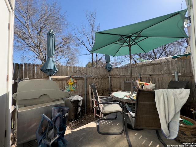 view of patio featuring a grill and exterior kitchen