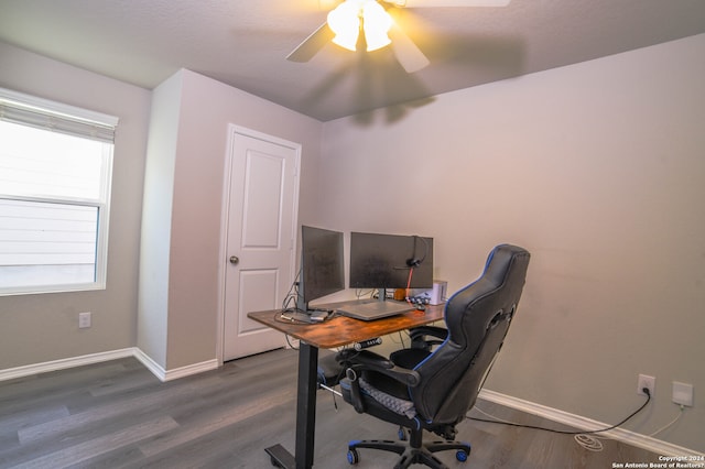 office area featuring ceiling fan and dark wood-type flooring