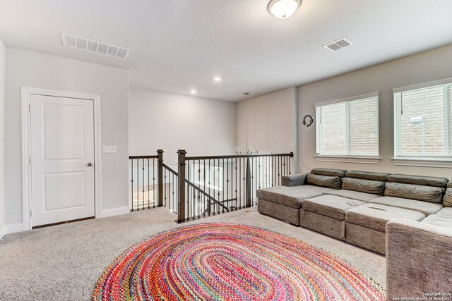 living room with light colored carpet