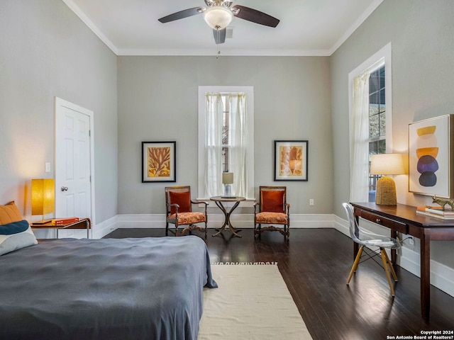 bedroom with ceiling fan, crown molding, and dark wood-type flooring