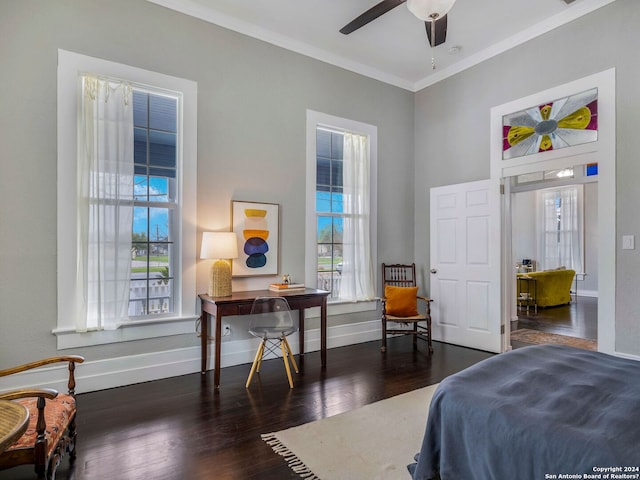 bedroom with ornamental molding, a ceiling fan, baseboards, and wood finished floors