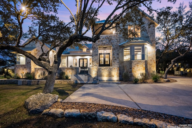 view of front of home with a yard