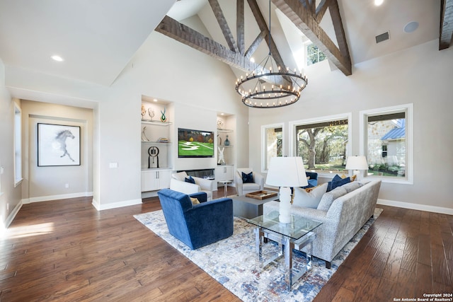 living room with a notable chandelier, beam ceiling, high vaulted ceiling, and dark wood-type flooring