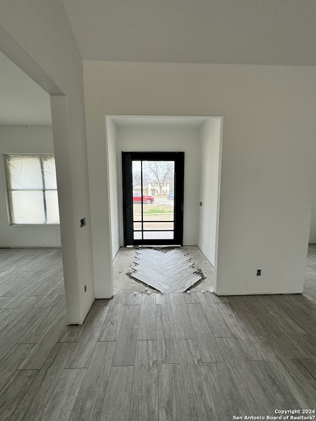 empty room with light hardwood / wood-style floors