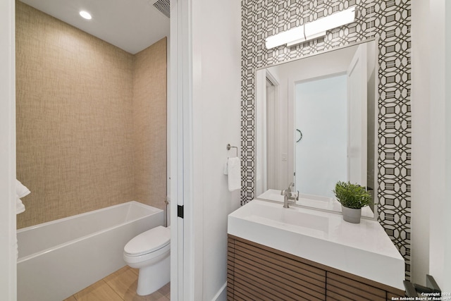 full bathroom with vanity, toilet, and bathing tub / shower combination