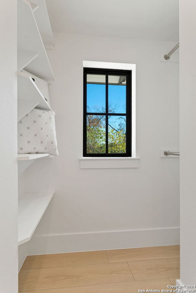 spacious closet with light wood-type flooring