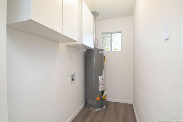 utility room featuring gas water heater