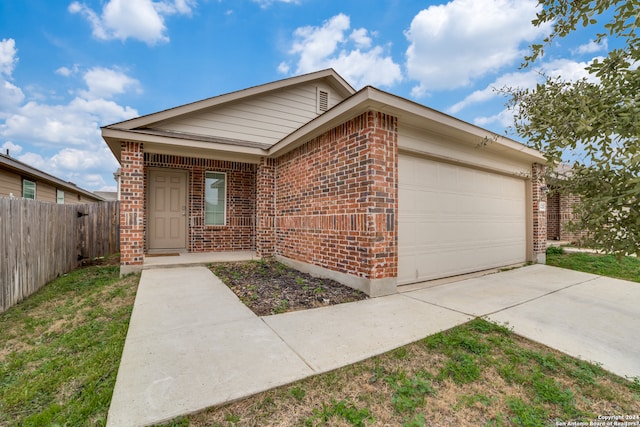 single story home with a garage