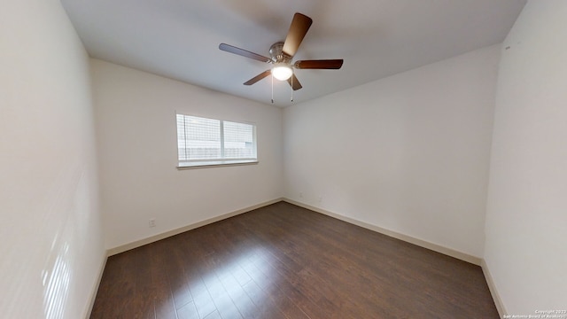 unfurnished room featuring dark hardwood / wood-style flooring and ceiling fan