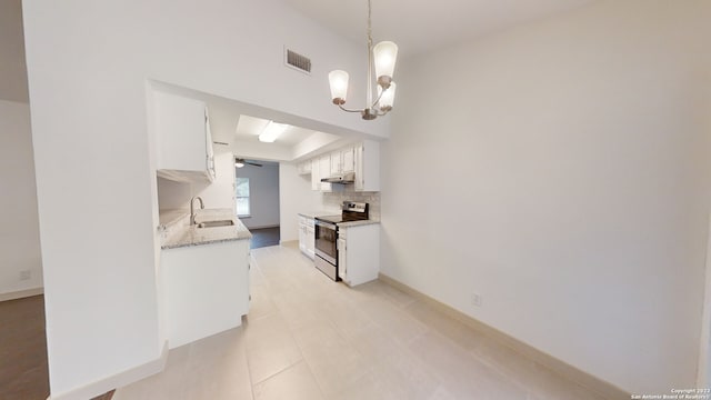 kitchen featuring pendant lighting, sink, stainless steel electric stove, white cabinetry, and a chandelier