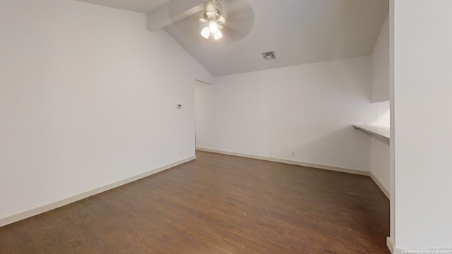 spare room with ceiling fan, lofted ceiling with beams, and dark hardwood / wood-style floors