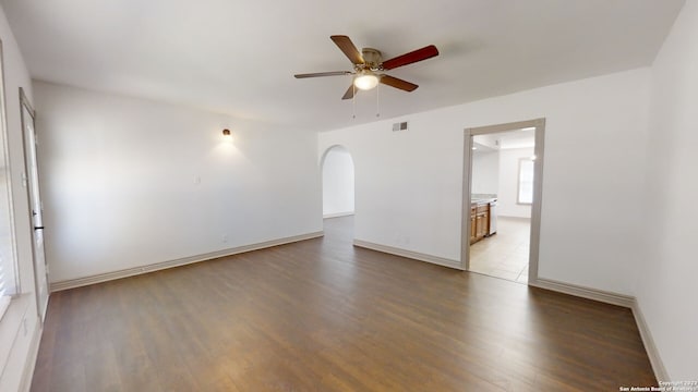 empty room with light hardwood / wood-style floors and ceiling fan