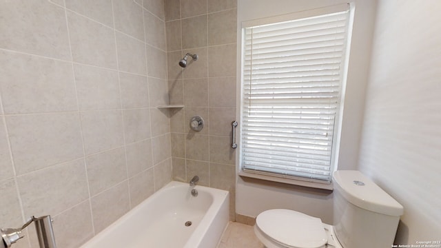 bathroom with a healthy amount of sunlight and toilet