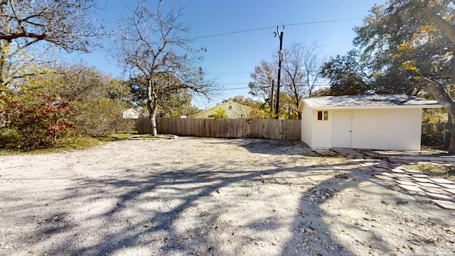 exterior space featuring a storage unit